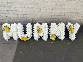 Mummy tribute flowers