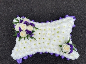 Purple and white pillow tribute